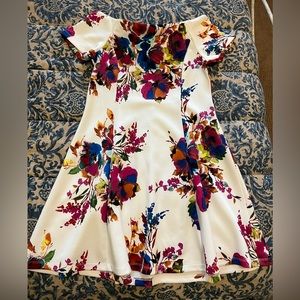 White and floral off the shoulder mini dress. Spence size 14